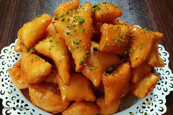 آموزش کامل پخت گوش فیل؛ شیرینی سنتی و ترد ایرانی